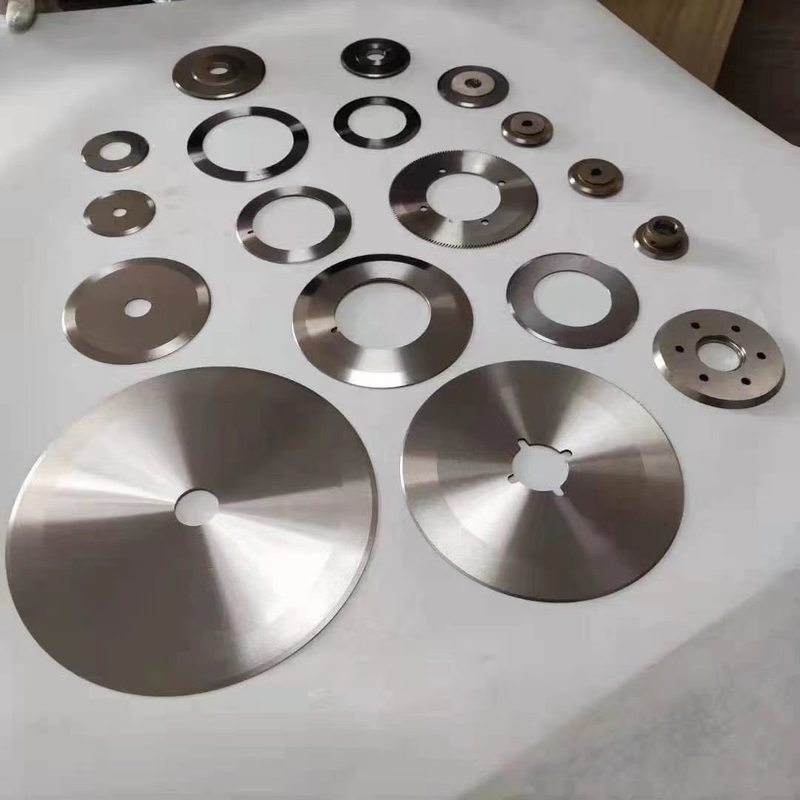 Stable and consistent rotary cutting blade made of materials for improved performance in paper industry